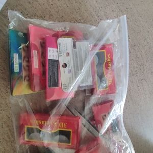 Brand new false eyelashes n wig caps assorted